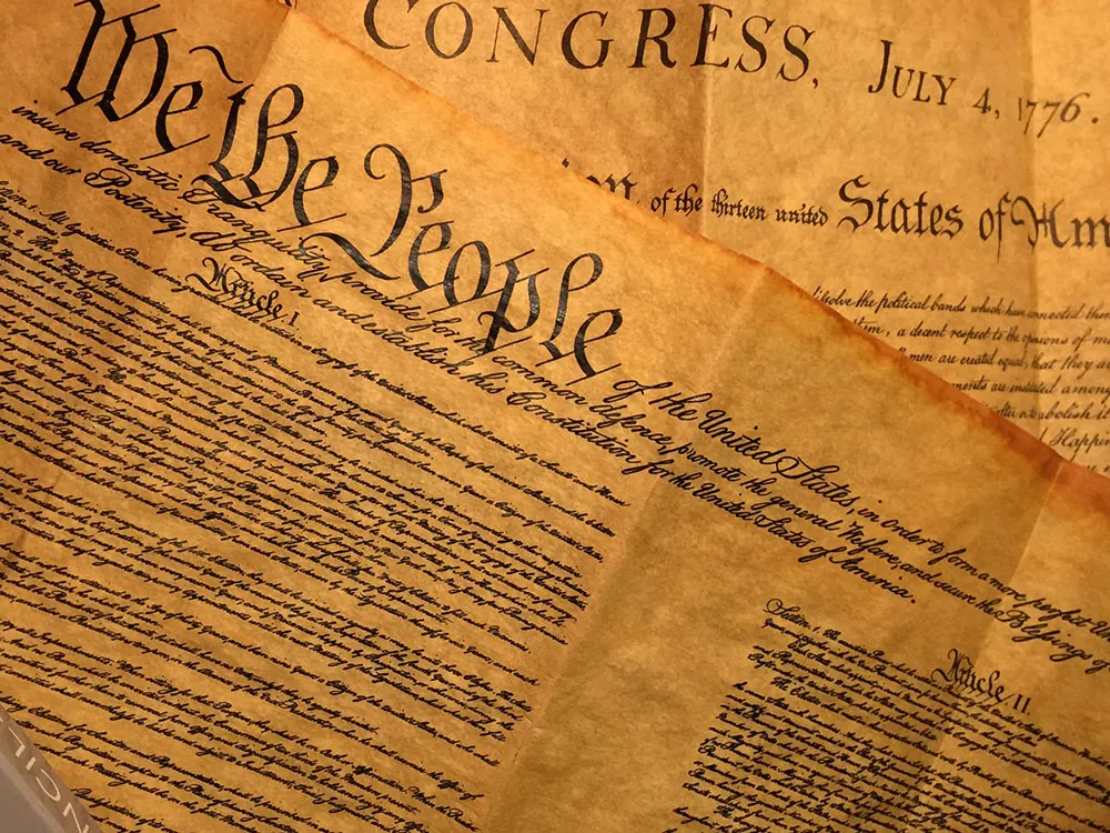Old sheets of paper with the US Constitution written on it.
