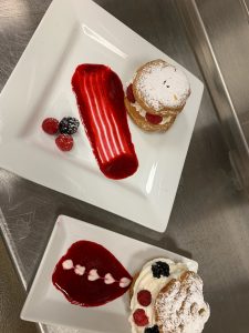 Plates with fancy desserts