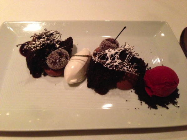 White plate with multiple desserts on it.